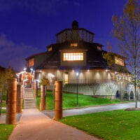 Evening view of residence halls on the York Hill Campus with lighted windows